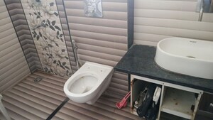 Bathroom in 3 BHK Apartment at Raja Park – for Rent
