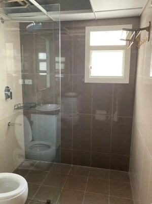 Bathroom in 3 BHK Apartment at Puravankara Palm Beach, Hennur – for Rent