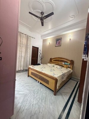 Bedroom in 3 BHK Builder Floor at Ansal Palam Triangle, Palam Vihar Extension – for Rent