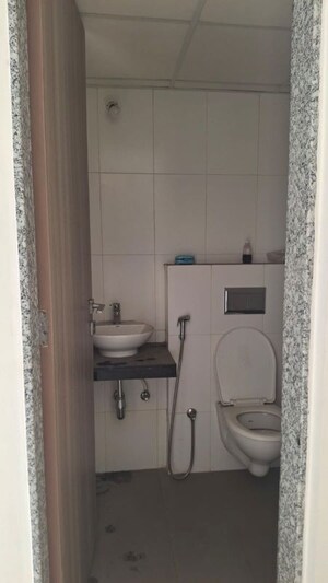 Bathroom in 1 BHK Apartment at Godrej Nirvaan, Themghar – for Rent