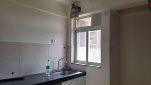 Kitchen in 1 BHK Apartment at Godrej Nirvaan, Themghar – for Rent