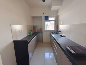 Kitchen in 2 BHK Apartment at Godrej Nirvaan, Themghar – for Rent