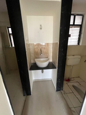 Bathroom in 1 BHK Apartment at RK Lunkad Nandadeep, Wakad – for Rent