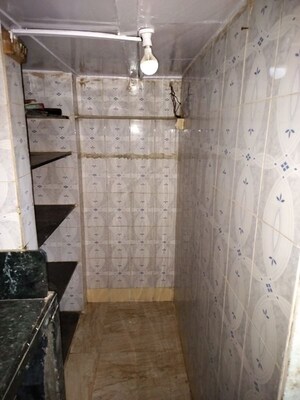 Bathroom in 1 RK Apartment at Mahada Building, Malad West – for Rent