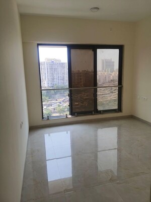 Room in 2 BHK Apartment at IM Applaud 38, Goregaon East – for Rent