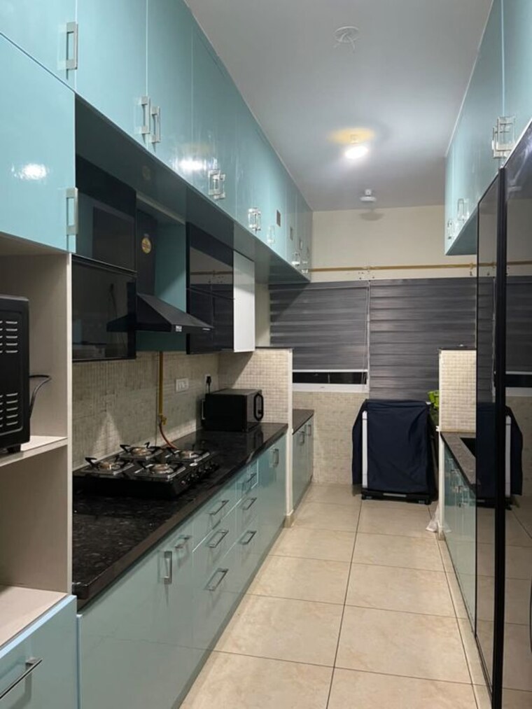 Kitchen, prestige-song-of-the-south-phase-2 3 Bedroom 1748 Sq.Ft. Apartment In Yelenahalli Bangalore 10448359