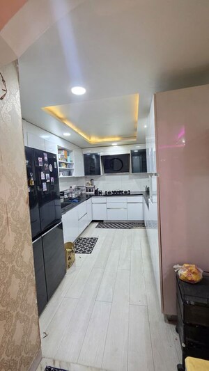 Kitchen in 4 BHK Builder Floor at Freedom Fighters Enclave – for Sale