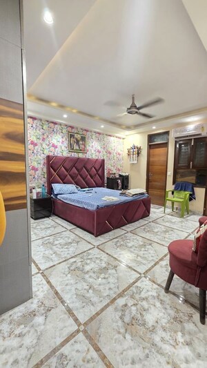 Bedroom in 4 BHK Builder Floor at Freedom Fighters Enclave – for Sale