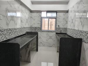 Kitchen in 1 BHK Apartment at DGS Sheetal Tapovan, Malad East – for Sale