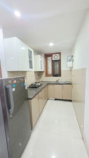 Kitchen in 2 BHK Builder Floor at Freedom Fighters Enclave – for Rent