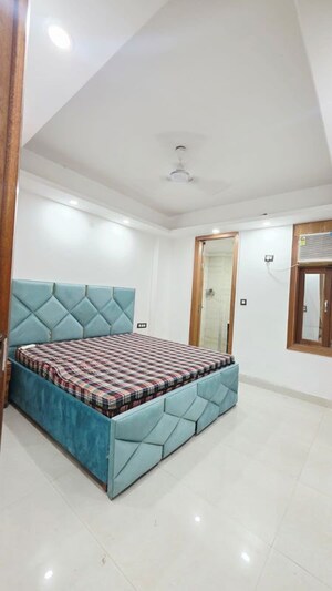 Bedroom in 2 BHK Builder Floor at Freedom Fighters Enclave – for Rent