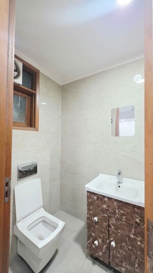 Bathroom in 2 BHK Builder Floor at Freedom Fighters Enclave – for Rent