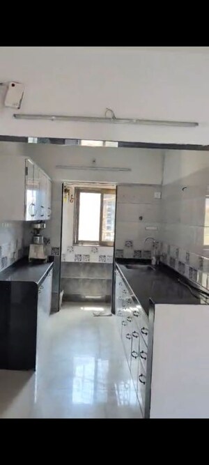 Kitchen in 2 BHK Apartment at Sudarshan Sky Garden, Ghodbunder Road – for Rent