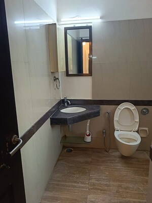 Bathroom in 3 BHK Apartment at K Raheja Heights, Malad East – for Rent