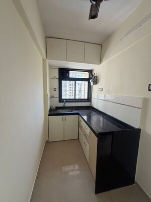 Kitchen in 1 BHK Apartment at Angelica Pride Park, Ghodbunder Road – for Rent