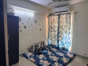 Bedroom in 3 BHK Apartment at Aditya Celebrity Homes, Sector 76 – for Rent
