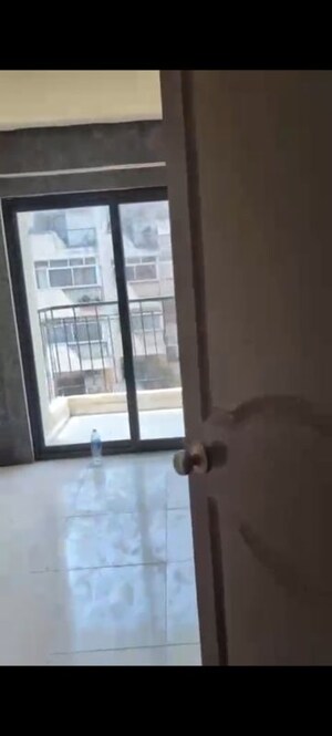 Room in 2 BHK Apartment at Charms Castle, Raj Nagar Extension – for Sale