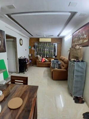 Living Room in 2 BHK Apartment at Oberoi Realty Park View, Kandivali East – for Rent