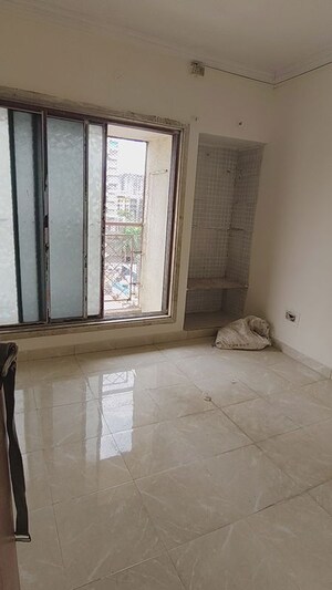 Bedroom in 2 BHK Apartment at Harsh Residency, Mira Road – for Rent