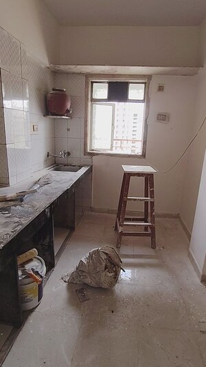 Kitchen in 2 BHK Apartment at Harsh Residency, Mira Road – for Rent