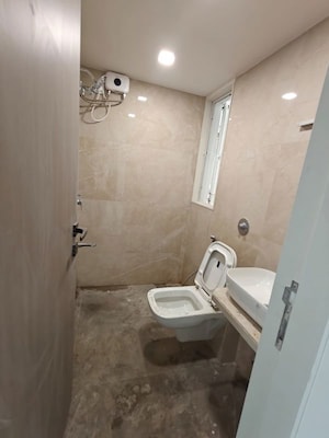 Bathroom in 2 BHK Apartment at Unique Aura Mumbai, Santacruz West – for Sale