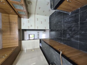 Kitchen in 2 BHK Apartment at N G Garden, Kandivali West – for Sale