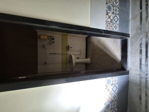 Kitchen in 2 BHK Apartment at N G Garden, Kandivali West – for Sale