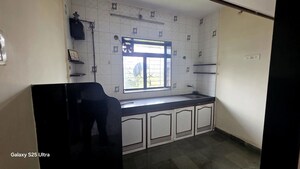 Kitchen in 1 BHK Apartment at Surya Enclave Co op hsg Society, Manpada – for Rent