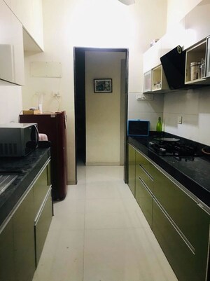 Kitchen in 1 BHK Apartment at Vijay Orovia, Ghodbunder Road – for Sale
