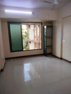 Room in 2 BHK Apartment at Poonam Darshan CHS, Jogeshwari East – for Rent
