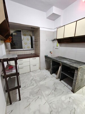 Kitchen in 1 BHK Apartment at Avillion Greenfields Co Op Housing Society, Jogeshwari East – for Rent