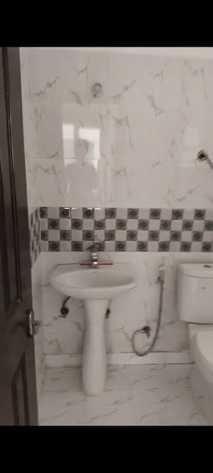 Bathroom in 2 BHK Apartment at Bankey Bihari Aggarwal Heights, Raj Nagar Extension – for Rent