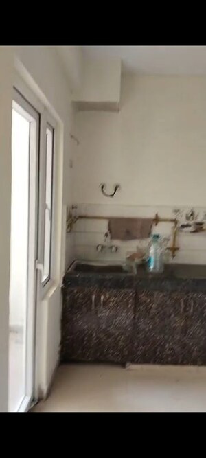Bathroom in 2 BHK Apartment at Bankey Bihari Aggarwal Heights, Raj Nagar Extension – for Rent