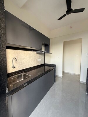 Kitchen in 3 BHK Apartment at Damji Shamji Mahavir Spring Tulip Phase 1, Pokhran Road No Two – for Rent
