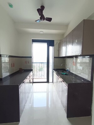 Kitchen in 2 BHK Apartment at Damji Shamji Mahavir Spring Tulip Phase 1, Pokhran Road No Two – for Rent