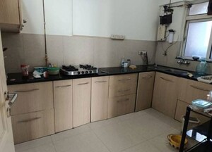 Kitchen in 3 BHK Apartment at Hiranandani Meadows, Manpada – for Rent