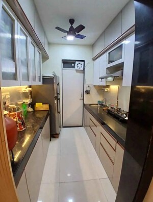 Kitchen in 1 BHK Apartment at Ashar Metro Towers, Vartak Nagar – for Sale