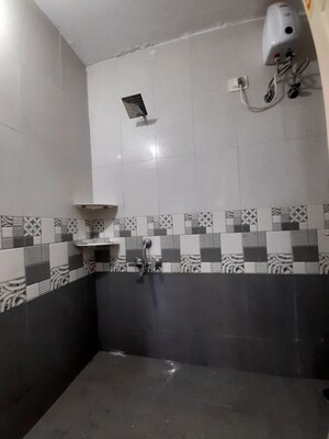 Bathroom in 1 BHK Apartment at Unnat Nagar CHS, Goregaon West – for Rent