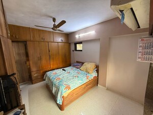 Bedroom in 2 BHK Apartment at Dheeraj Kirti, Malad West – for Rent