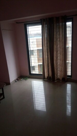 Room in 2 BHK Apartment at Dheeraj Kirti, Malad West – for Rent