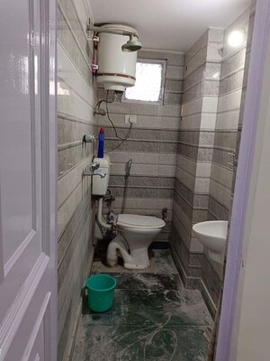 Bathroom in Studio Builder Floor at Amar Colony – for Rent