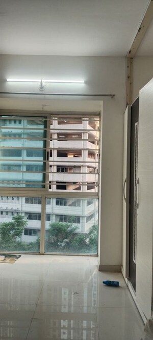 Bedroom in 2 BHK Apartment at Sheth Vasant Lawns, Laxmi Nagar – for Rent
