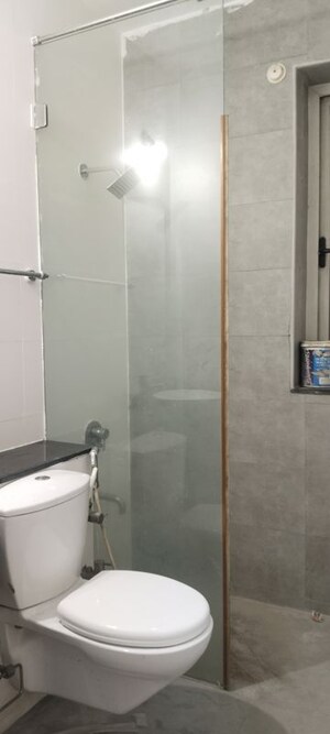 Bathroom in 2 BHK Apartment at Sheth Vasant Lawns, Laxmi Nagar – for Rent