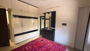 Bedroom in 2 BHK Apartment at Dynamix Divum, Malad East – for Rent