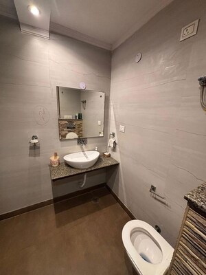 Bathroom in 4 BHK Builder Floor at Green Fields Colony – for Rent