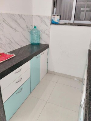Kitchen in 1 BHK Apartment at Ruparel Elara, Kandivali West – for Rent