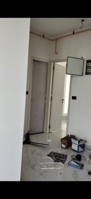 Building Lobby in 2 BHK Apartment at Ruparel Sky Green, Kandivali West – for Rent