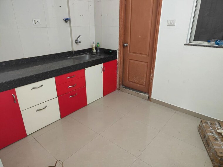 Kitchen, devi-sacred-world 2 Bedroom 1100 Sq.Ft. Apartment In Wanowrie Pune 10470787