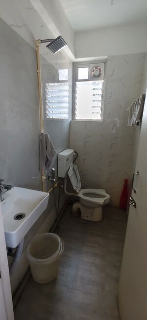 Team Area in 2 BHK Apartment at Ruparel Ariana, Parel – for Rent