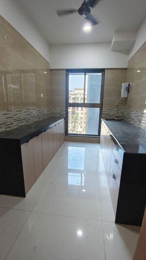 Kitchen in 2 BHK Apartment at Raj Infinia, Malad West – for Sale